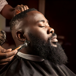 Firefly black man getting beard trimmed at a salon 34954